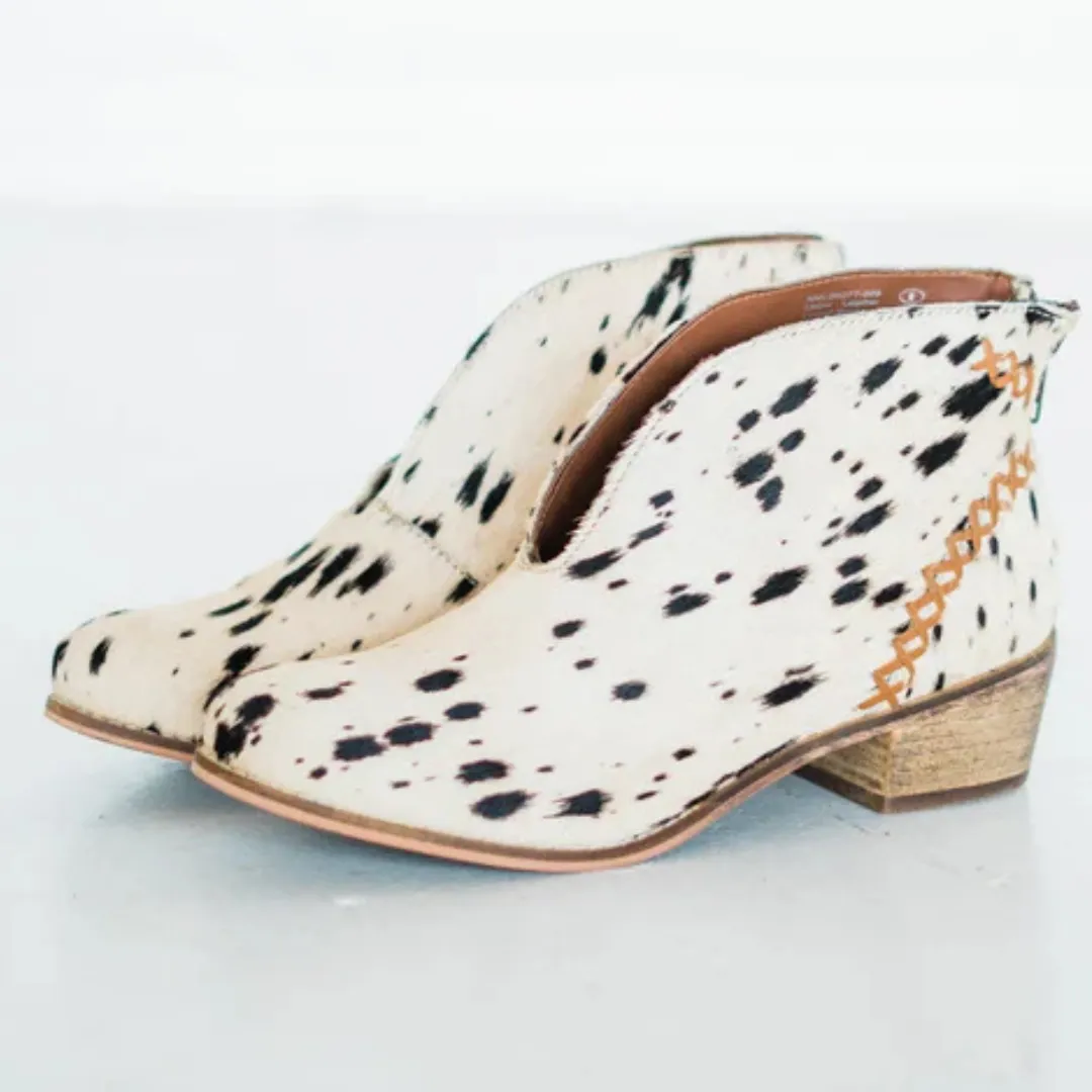 Online Exclusive | All Roads Bootie in Black and White Cow Print