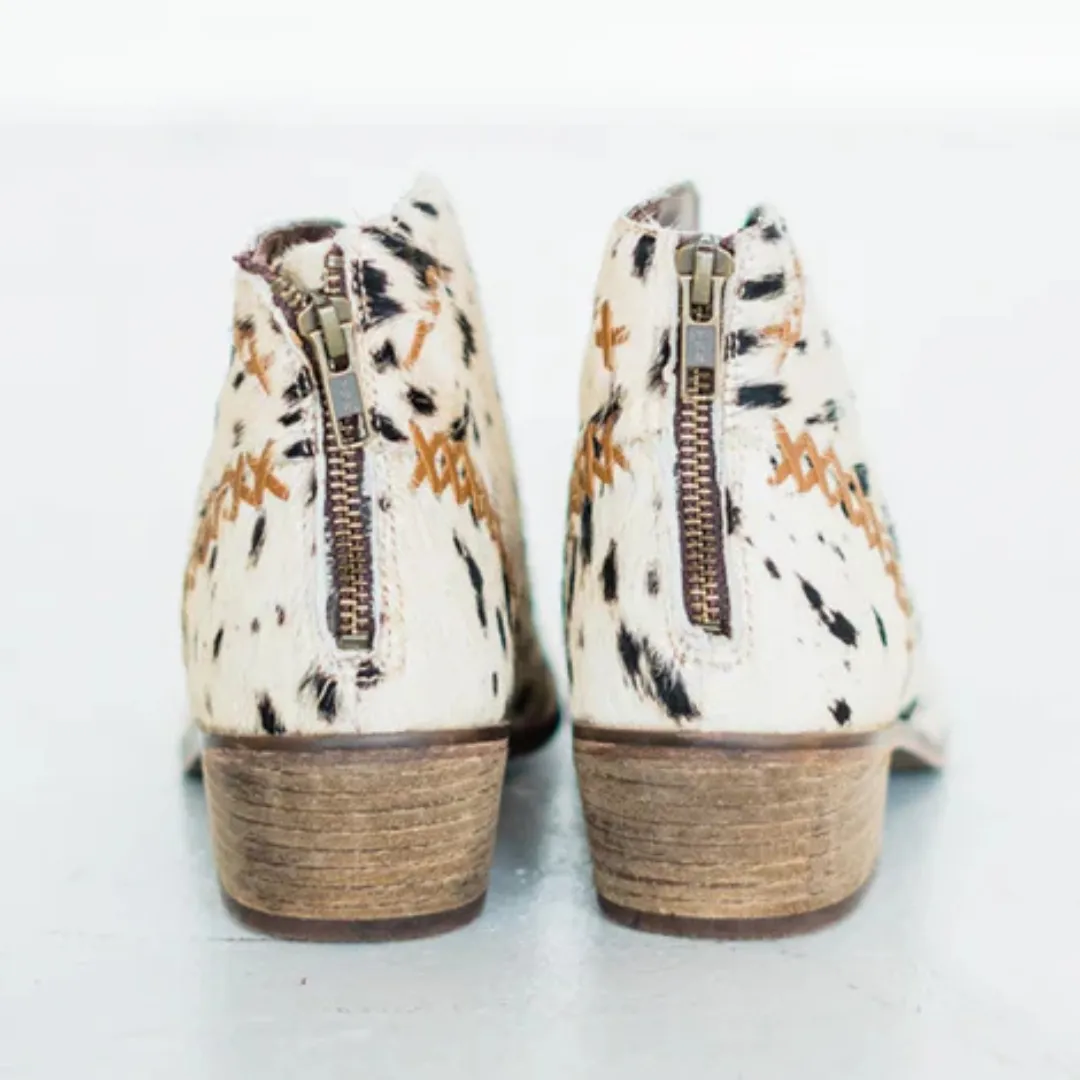 Online Exclusive | All Roads Bootie in Black and White Cow Print