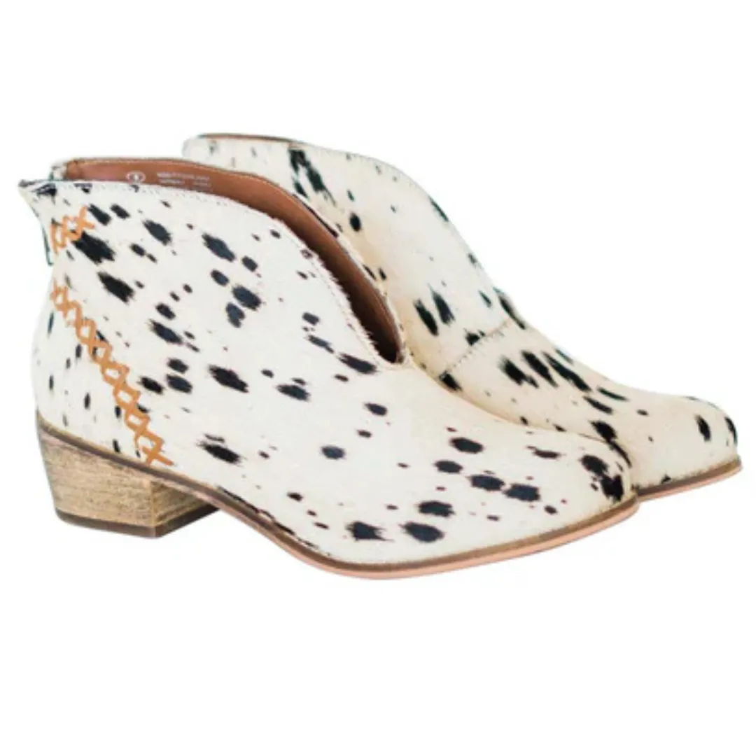 Online Exclusive | All Roads Bootie in Black and White Cow Print